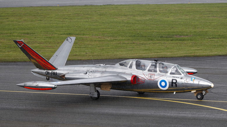 Fouga Magister parked on runway