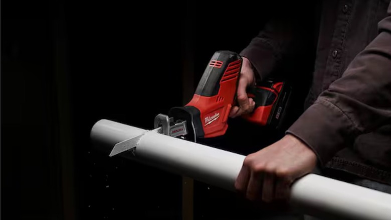 M18 Hackzall Recip Saw cutting a pipe