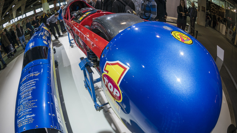 The Ack Attack motorcycle parked in a show room