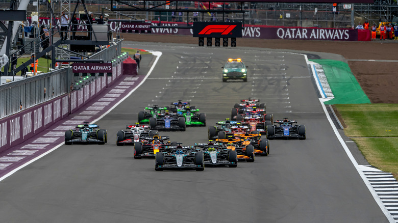 F1 cars leaving the starting line