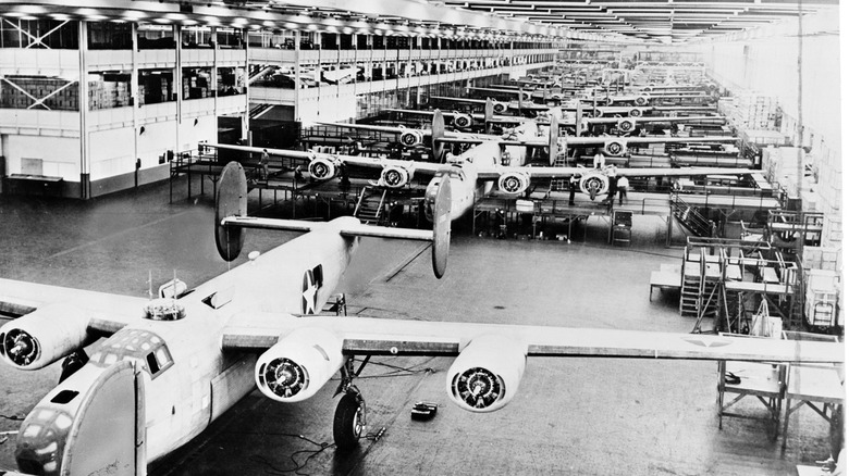 Lineup of Consolidated B-24 Liberator bombers on Willow Run production line, front-view