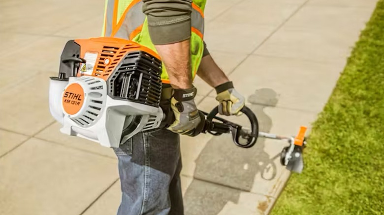 Stihl KM 131 R powering KombiSystem tool