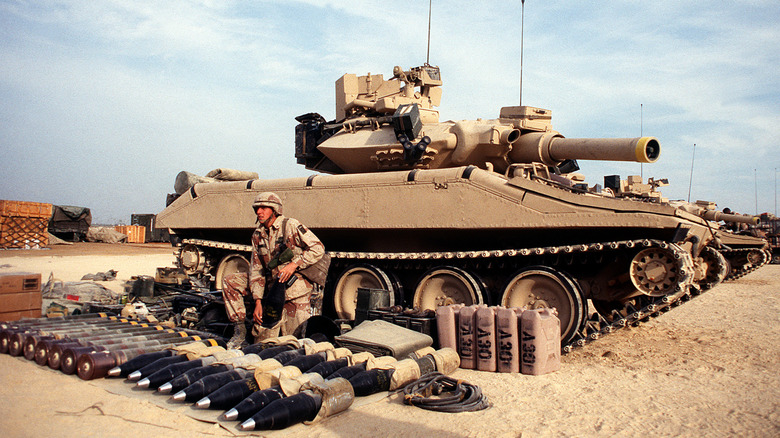 An M551 Sheridan light tank with its ammo load laid out beside it