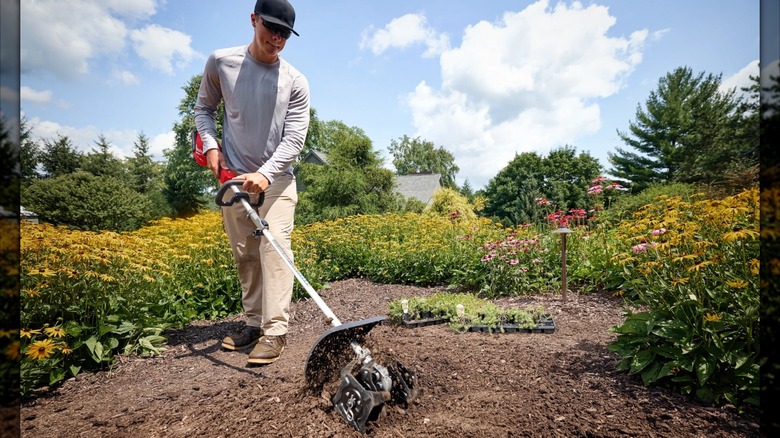 Milwaukee Quik-Lok Cultivator in use