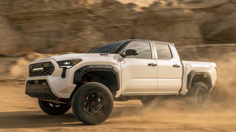 Front 3/4 view of Toyota Tacoma in desert setting