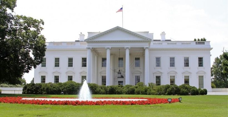 Workers conduct demolition on the White House's North Lawn