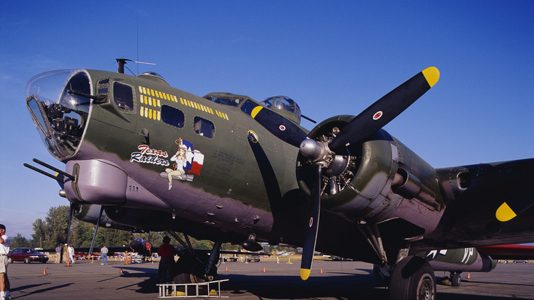 Side view of B-17 Flying Fortress on the runway.