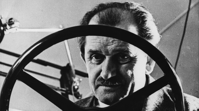 Ferdinand Porsche viewed through VW Beetle steering wheel