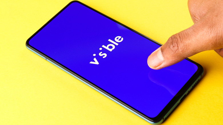 Visible carrier logo on a smartphone screen