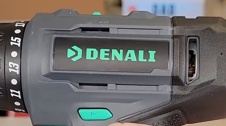 The Denali logo on the side of a drill.
