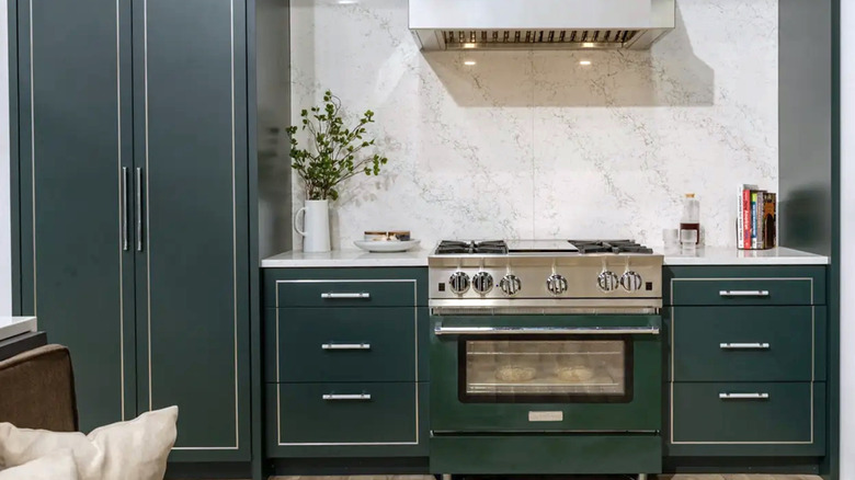 Green BlueStar oven and range set up in a modern kitchen