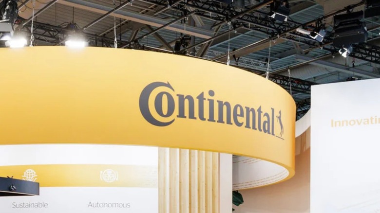 A Continental tire sign at a trade show