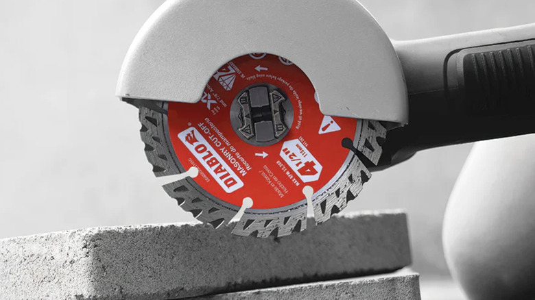 Diablo's industrial-grade diamond blade displayed over a concrete slab.