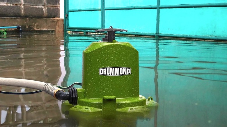 Drummond Sump Pump submersed in a flooded storage space