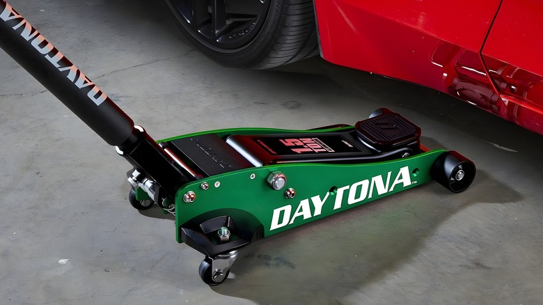 Floor jack next to car