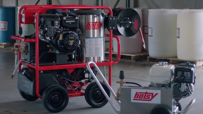 Hotsy pressure washers in a warehouse.