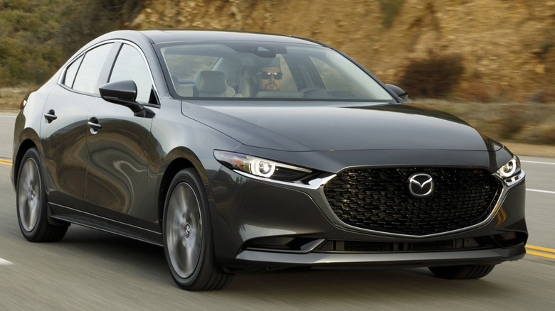 Front 3/4 hero shot of the 2019 Mazda Mazda3 Sedan