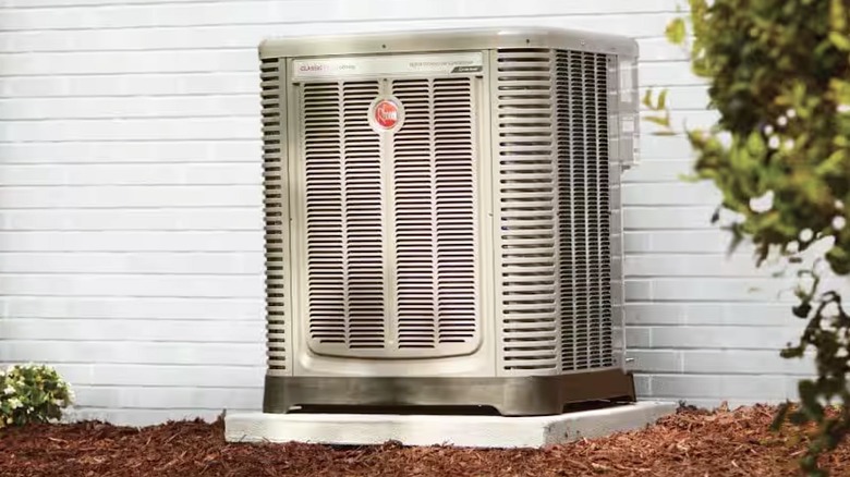 Rheem air conditioning unit set up outside of a residential home
