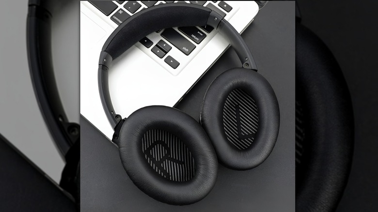SoloWIT headphones resting on laptop keypad