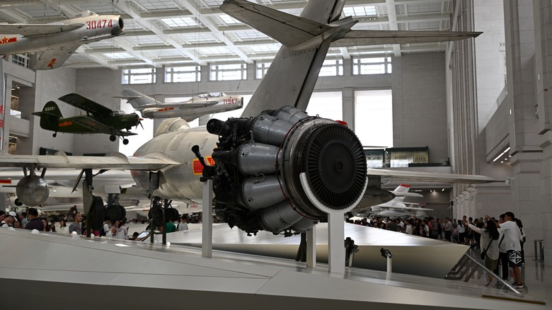 A MiG-15bis fighter aircraft and its VK-1 jet engine on display