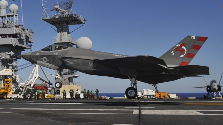an F-35C landing on the USS Nimitz