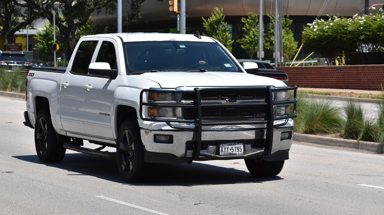 White Chevy Silverado on road