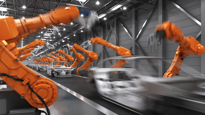 Unfinished cars running through production line
