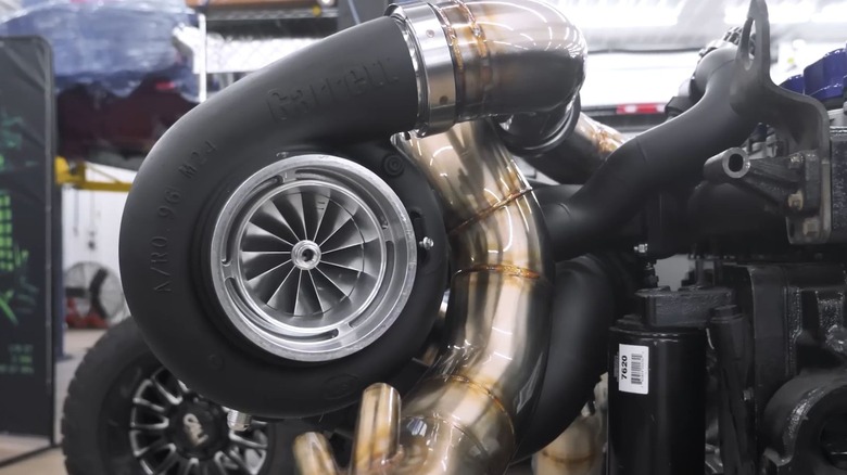 Closeup of a turbocharger installed on a diesel engine