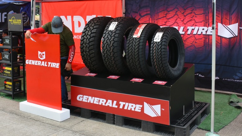 a general tire booth at an auto show of some kind