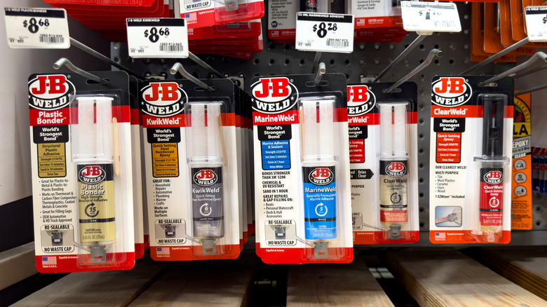 A selection of J-B Weld Twin Tube products on a store shelf