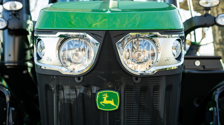 Front close up shot of a John Deere 5115 GF tractor