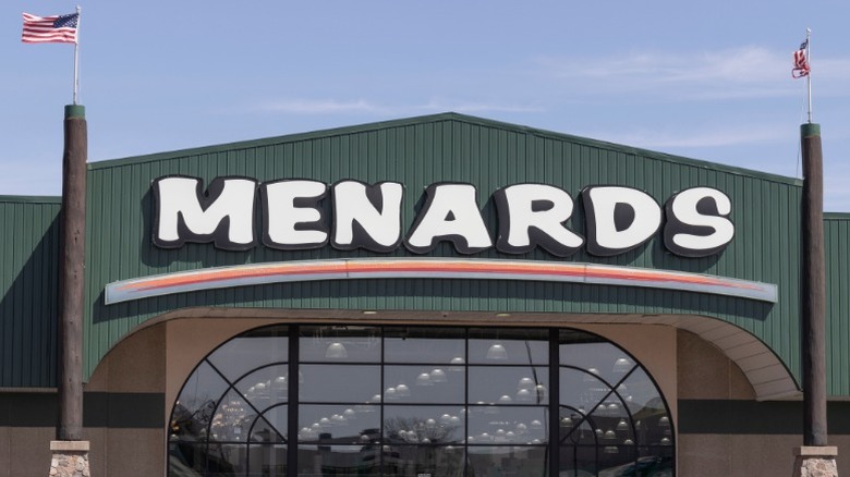 A Menards storefront against a blue cloudless sky