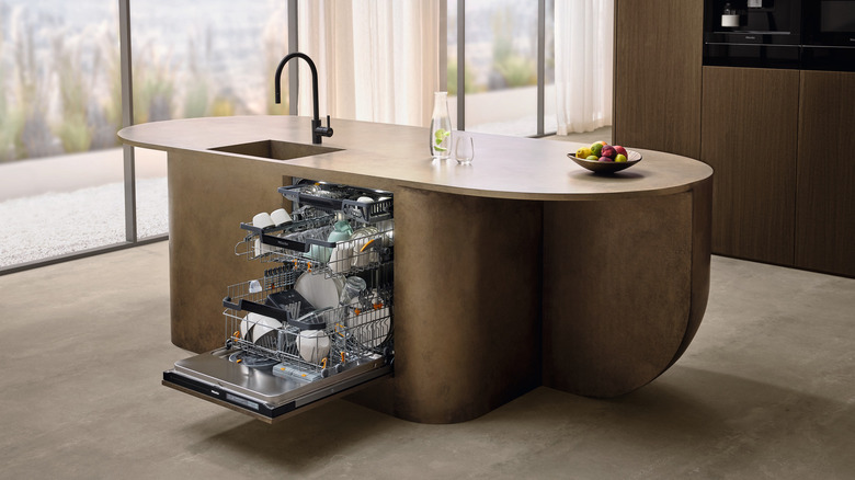 Miele dishwasher in freeform enclosure in a residential setting