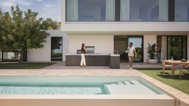 Miele 'Dreams' outdoor kitchen near swimming pool