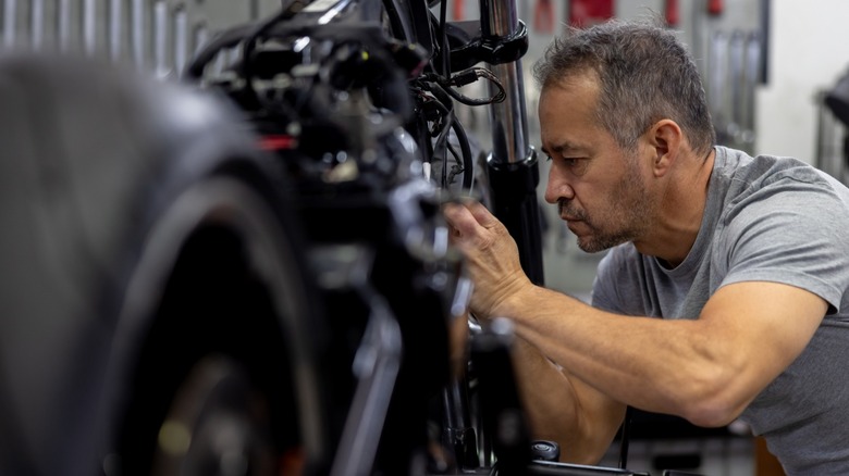 Mechanic working on a motorcycle