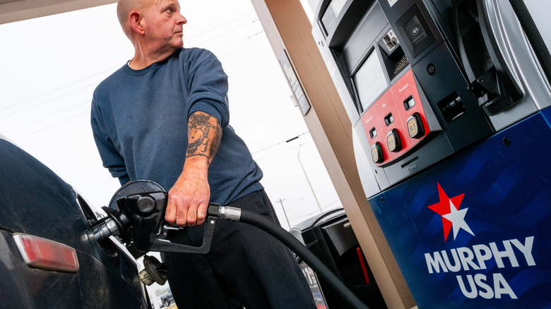 Man pumping gas at Murphy USA