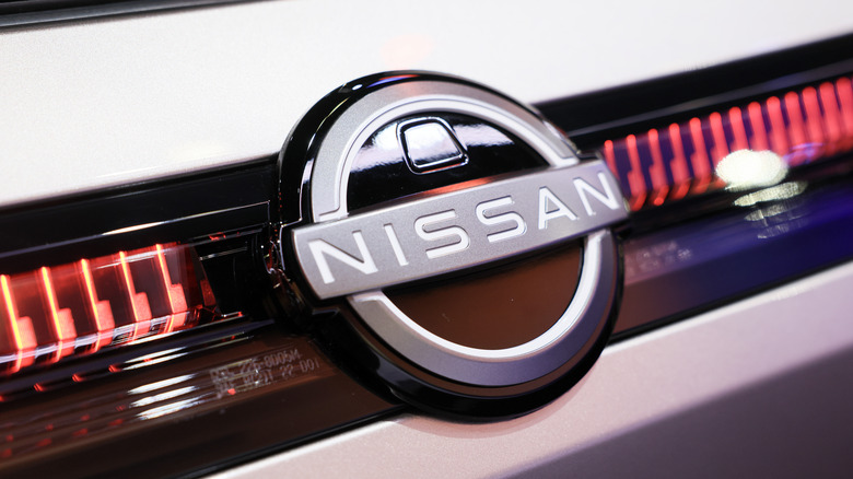 The Nissan badge on a car's rear