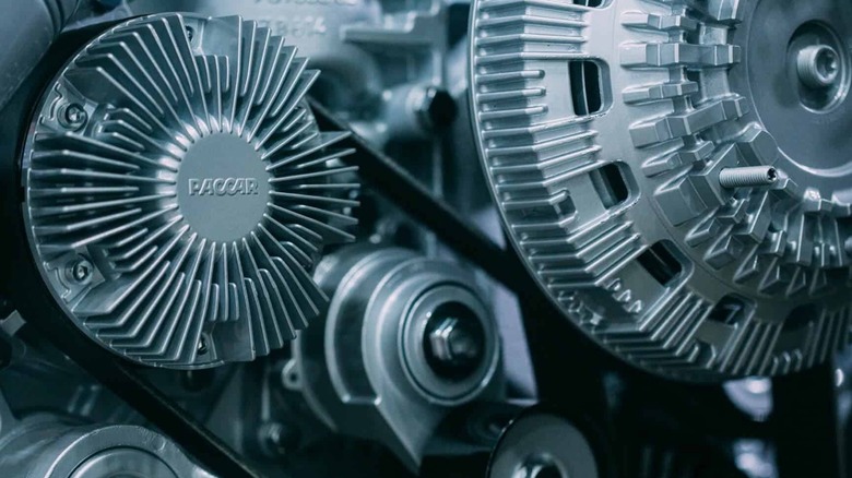 A close-up of a PACCAR engine showing the logo