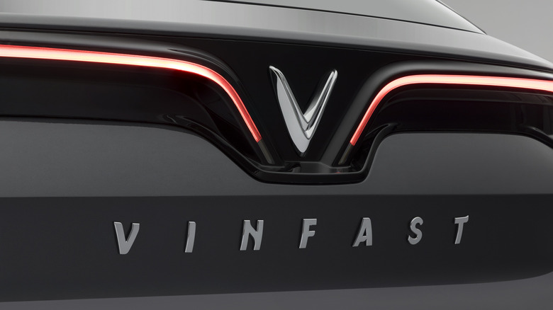The VinFast logo on the back of the electric VF8