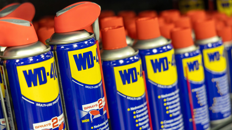 Bottles of WD-40 on store shelves
