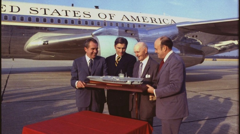 Carl Vinson receiving a model of the USS Carl Vinson from President Nixon