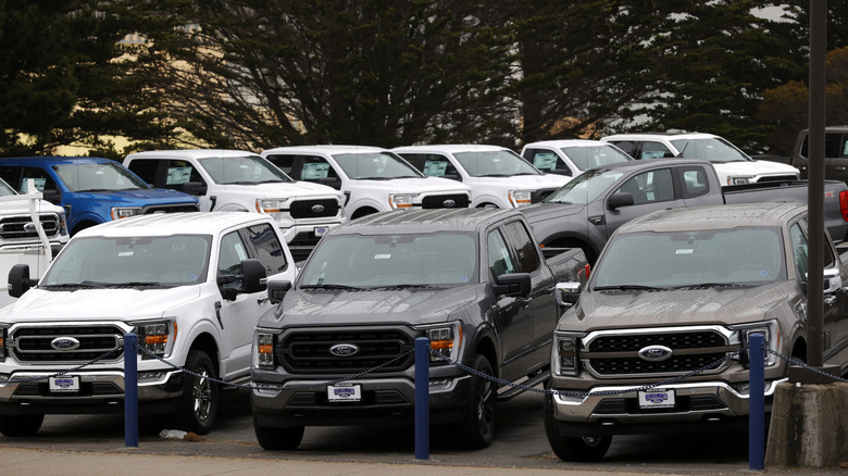 Ford pickup trucks on dealer lot during 2022