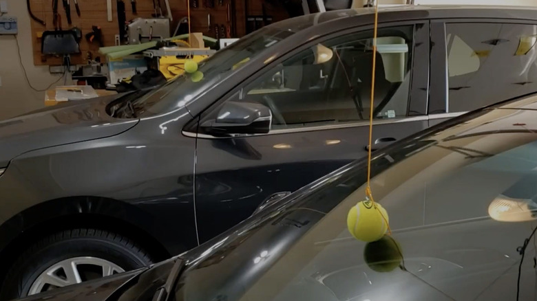 Tennis ball parking markers in garage