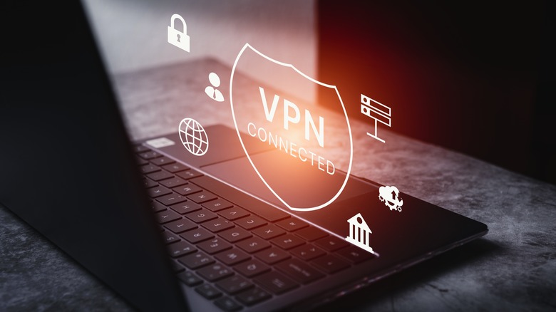 A black laptop with a graphic above stating VPN Connected with icons for a padlock, the internet, the cloud, and more.
