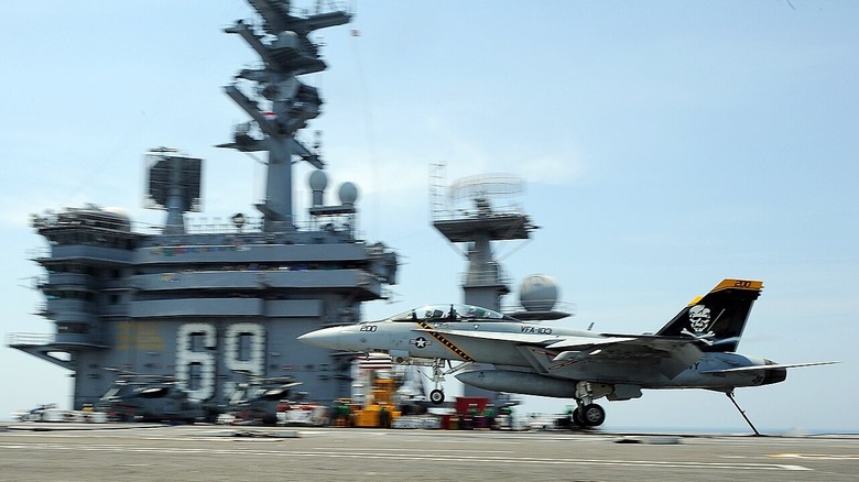 Capt. Roy J. Kelly, commander of Carrier Air Wing (CVW) 7, lands aboard the Nimitz-class aircraft carrier USS Dwight D. Eisenhower (CVN 69) on the first day of flight operations.