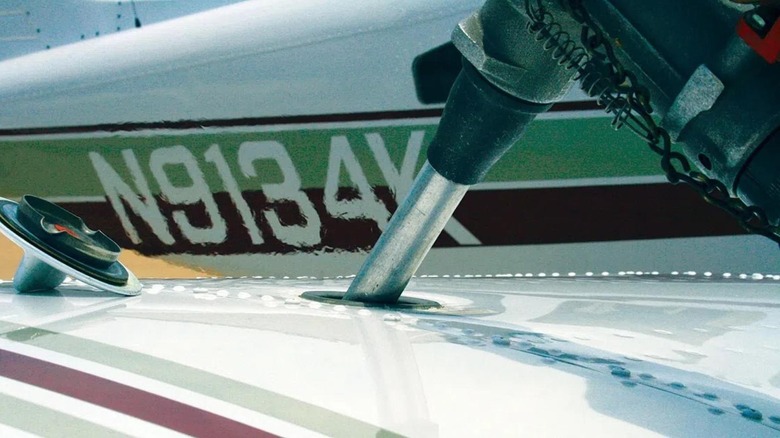 Close-up of a Piper PA 32R right wing during refueling