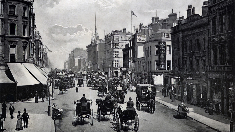 The busy street of Oxford street London filled with wagons