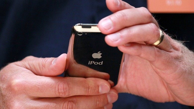 iPod touch held by hands