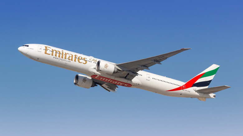 Emirates Boeing 777 flying in the air