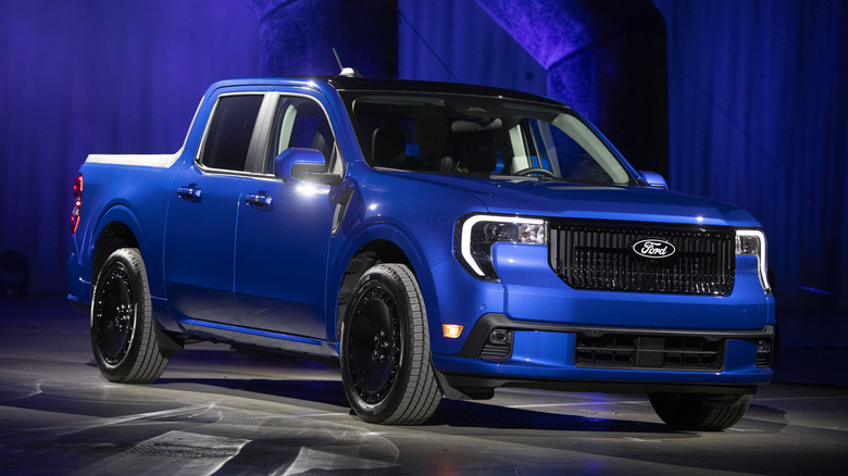 Front 3/4 view of Ford Maverick hybrid pickup truck in studio setting